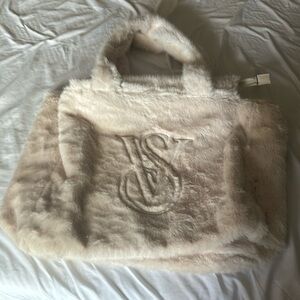 Brand new Victoria Secrets plush tote with tags and zipper cover. w/ VS logo.
